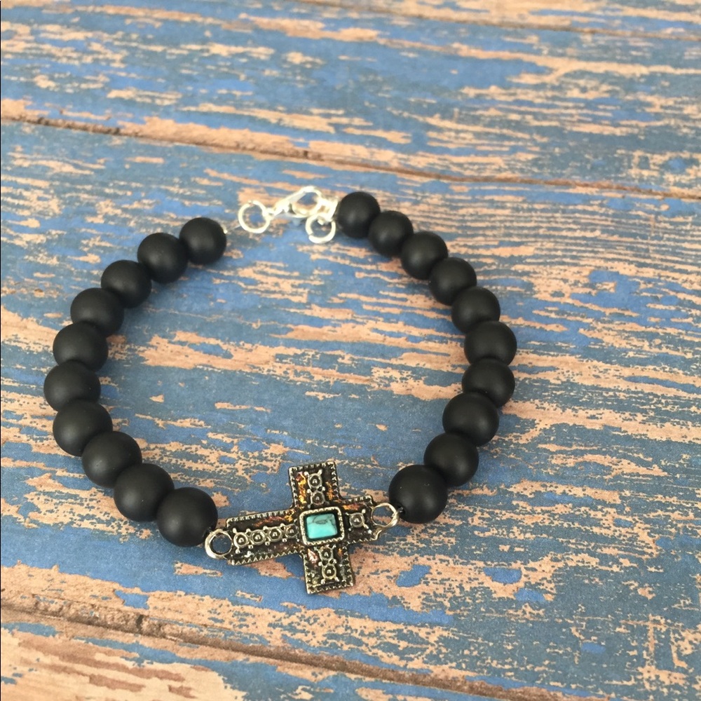 Men’s black beaded and silver cross bracelet